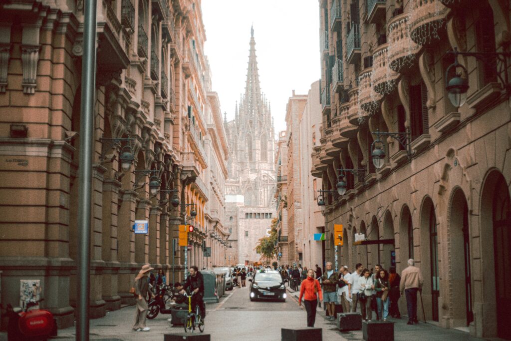 Street view in Barcelona's Gothic Quarter with cathedral.